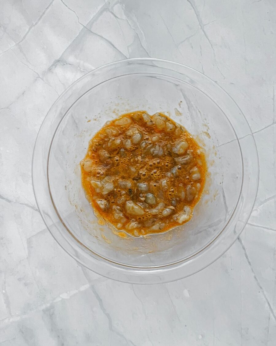 Mix 2 eggs with ground pork, oyster sauce, salt, and pepper well. 