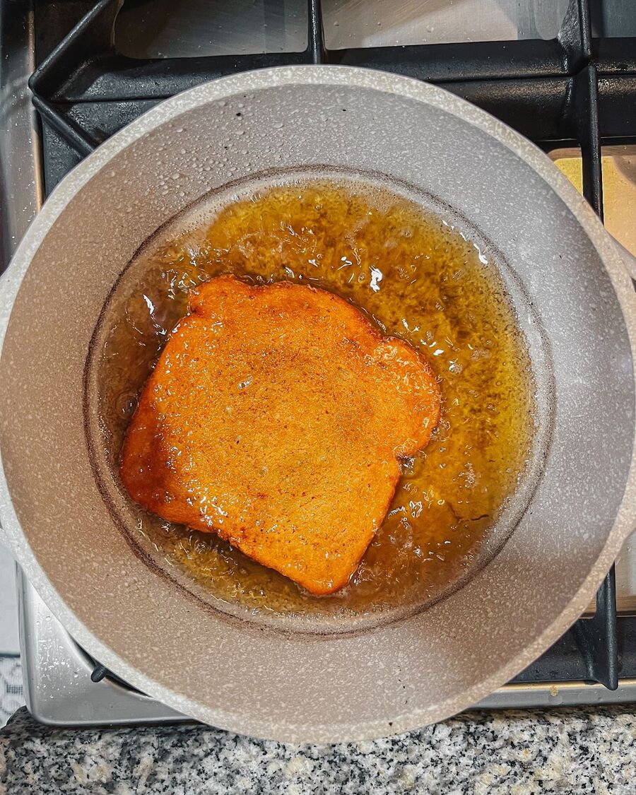 Flip the bread over to cook the pork side for about 3-4 minutes in the oil.