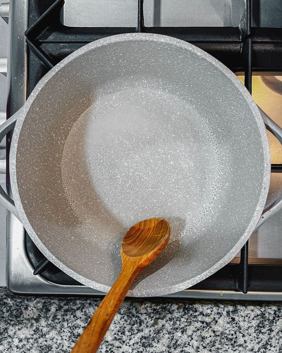 Stir the mixture continuously until it thickens, then remove it from the heat. Let the vinegar mixture cool completely at room temperature.