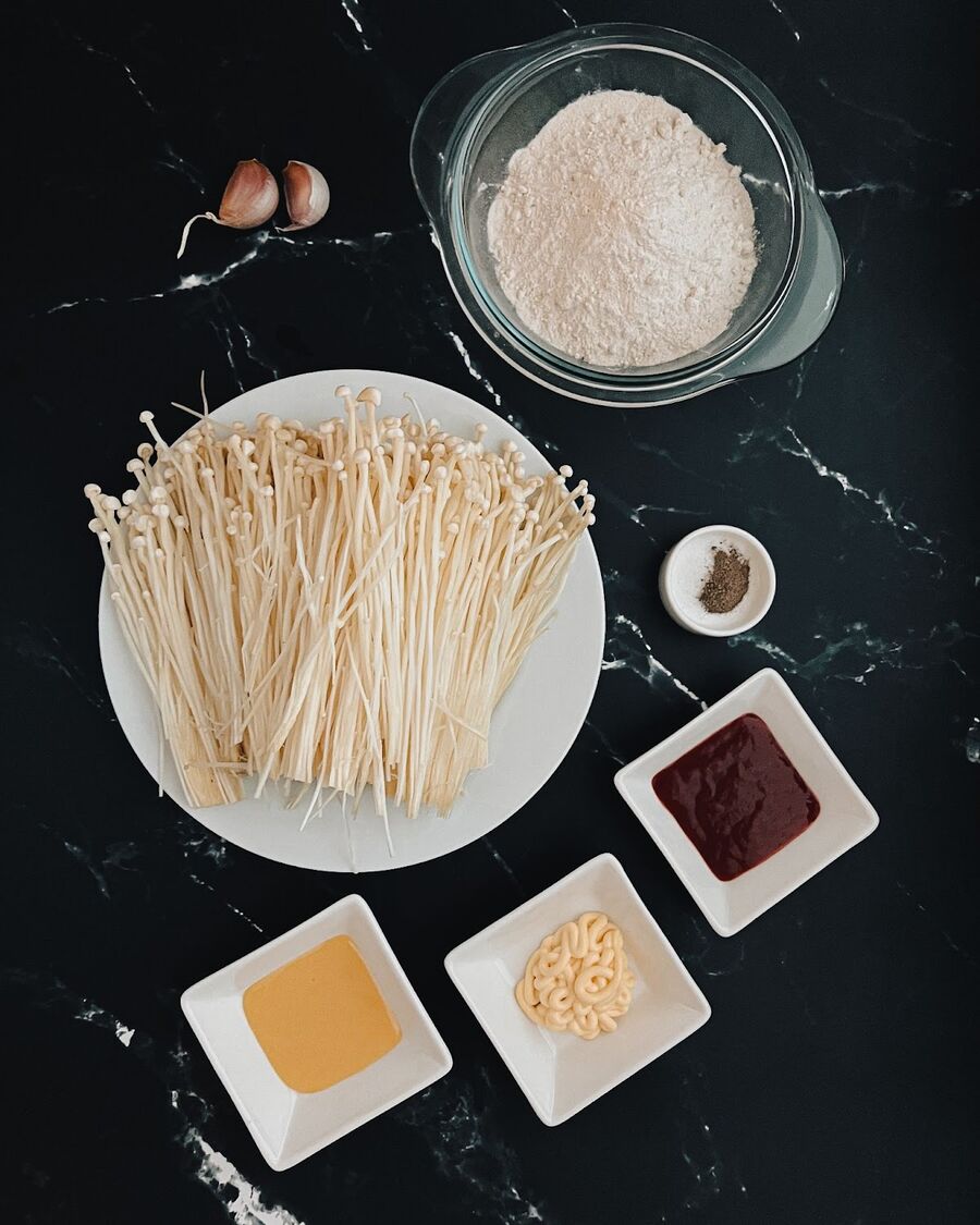 Gather all the necessary ingredients. Wash the Enoki mushrooms thoroughly and dry them well.