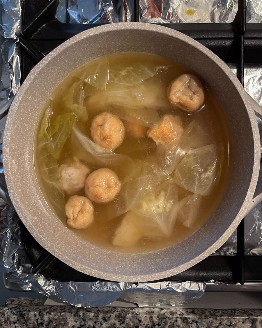 Let the chicken broth cube infuse into the soup. Additionally, if you have shrimp balls or fish balls, you can add them to the soup as well.