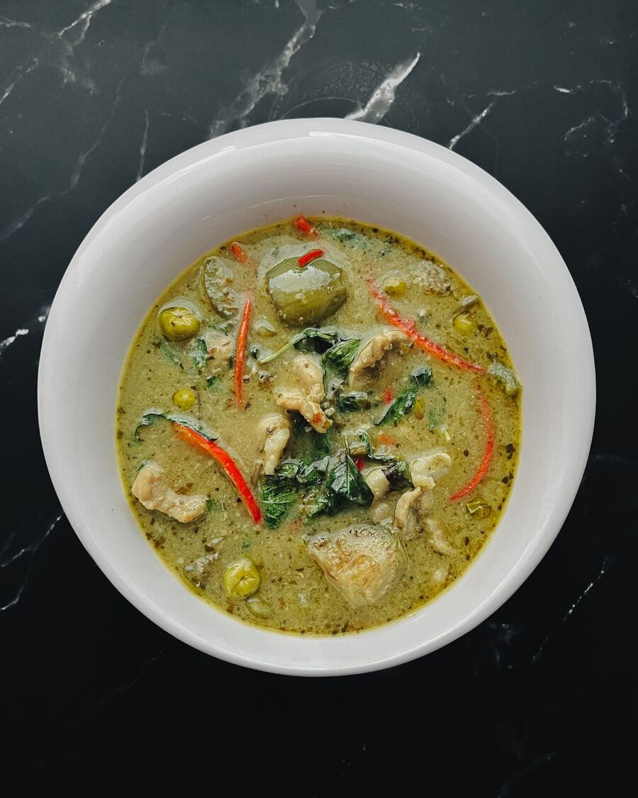 You should all be set for the green curry. Transfer it to a large serving bowl to share, or into individual bowls to prepare for serving.