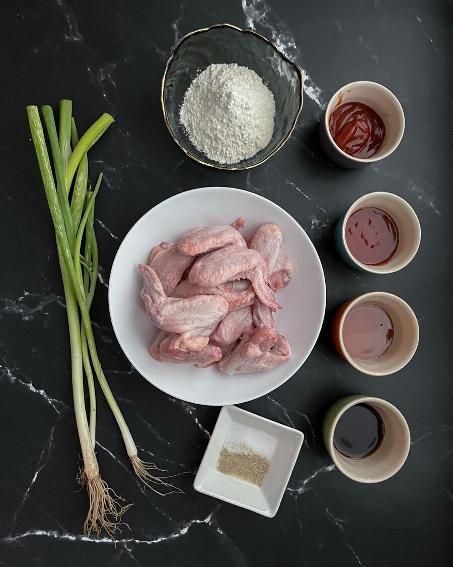 Gather all the essential ingredients, wash the wings, and dry them thoroughly with paper towels before marinating.
