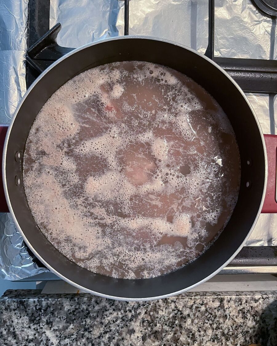 Start with a large pot and bring the pork bone and ribs to a boil over medium-high heat, ensuring the water level just covers the pork. After about 5 minutes, when the water begins to boil and bubbles appear, remove from the heat. Drain the pot, and refill it with fresh water, about 1.5 liters, before bringing it back to a boil.