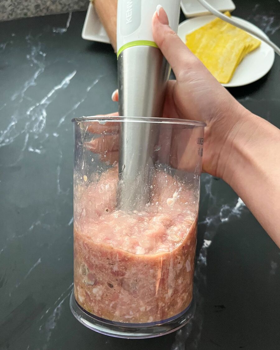 Transfer all the mixed filling into a food processor. Grind them until they are thoroughly combined, smooth, and have a thick consistency.