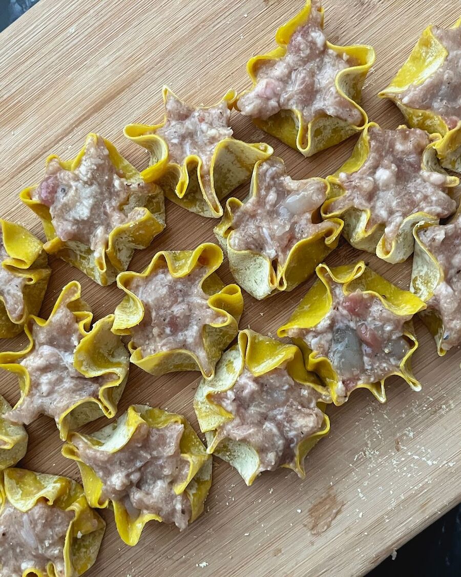 You can prepare these Kanom Jeeb within a day or week of cooking. Store them in a container and freeze. Defrost before steaming.