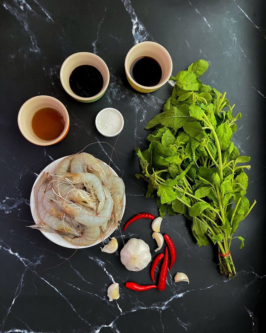 First, gather all your essential ingredients. Next, prepare the shrimp by giving them a good rinse in cold water. Remove the head, shell, and antennae, and be sure to devein and rinse them thoroughly.