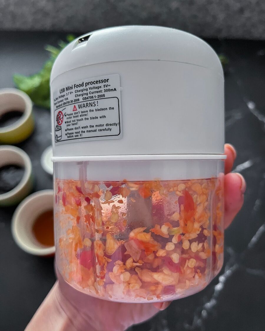 Use a food processor to blend the garlic and chili together until they form a well-combined mixture.