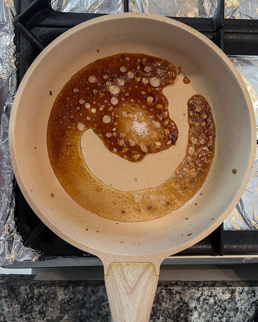 Using the same pan, prepare the mixture of oyster sauce over low heat. Add the oyster sauce, soy sauce, sugar, and stir them together until they are well combined.