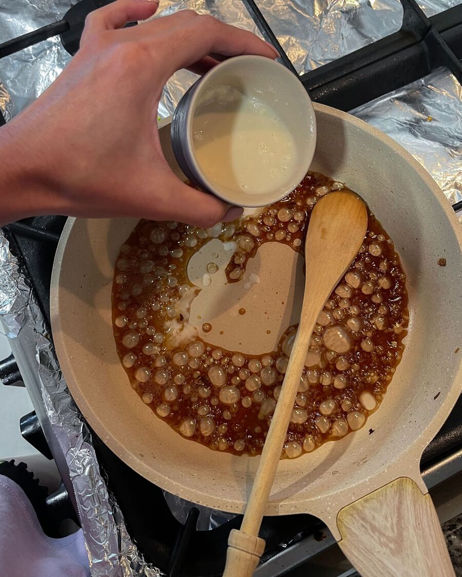 Once the oyster sauce mixture is well combined, slowly pour the tapioca slurry into the sauce and stir it well. Then, remove it from the heat.