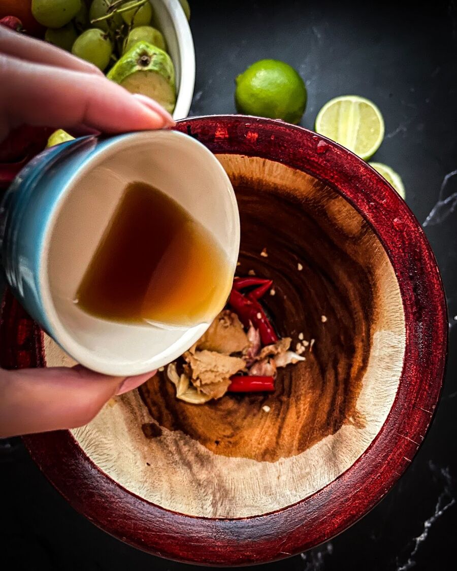 Add the palm sugar and fish sauce.