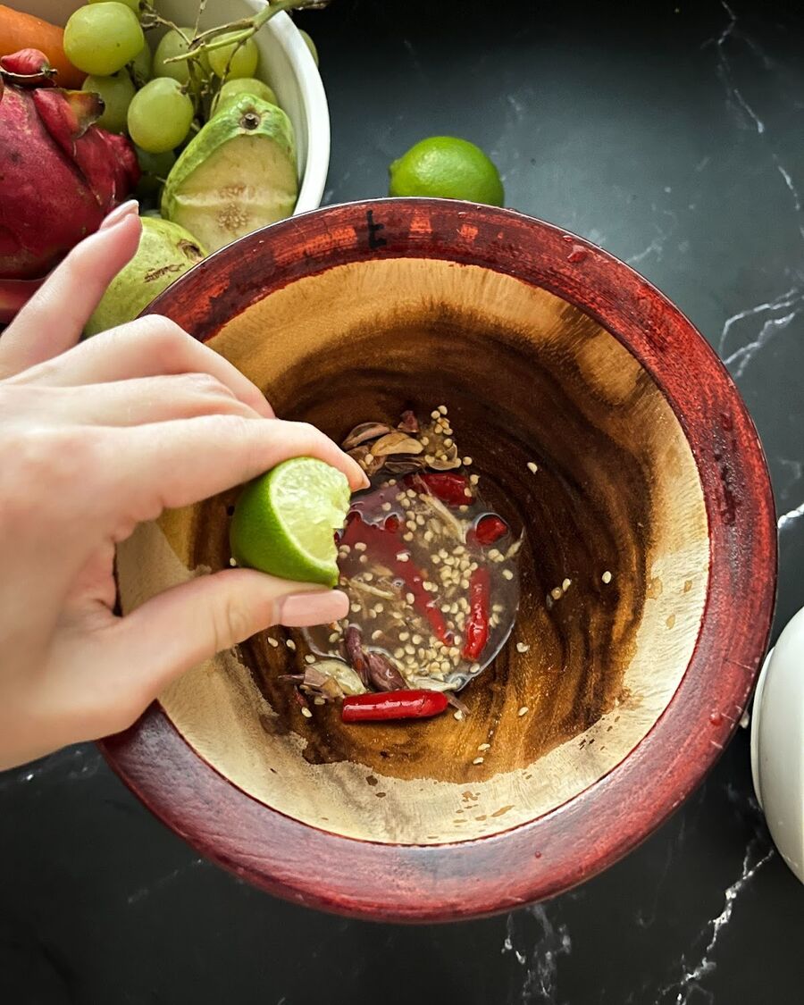 Squeeze the lime juice into the sauce mixture.