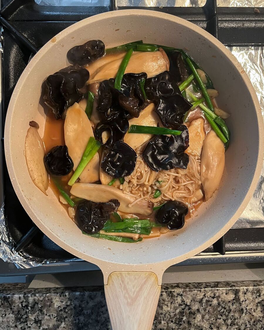 Add the green onions (optional for garnish). Combine them well.