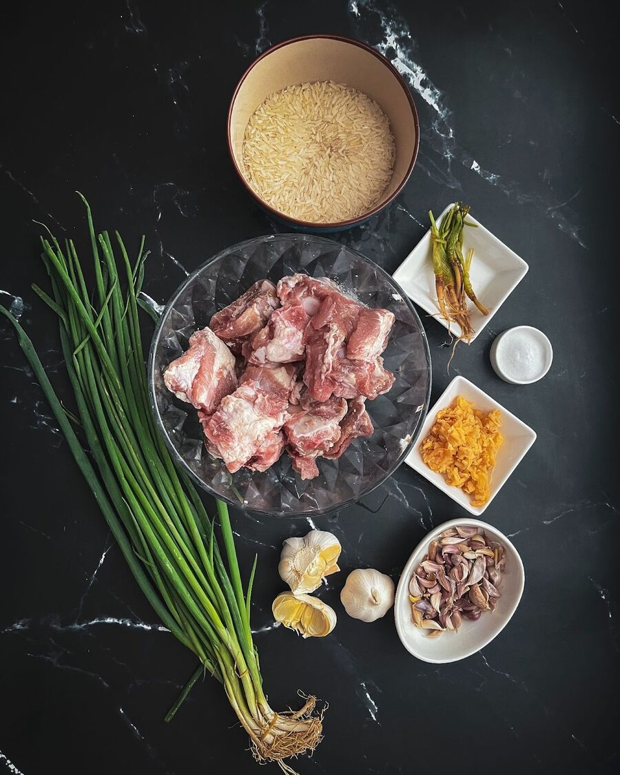 Begin by gathering all the essential ingredients. Thoroughly wash and drain the Jasmine rice.