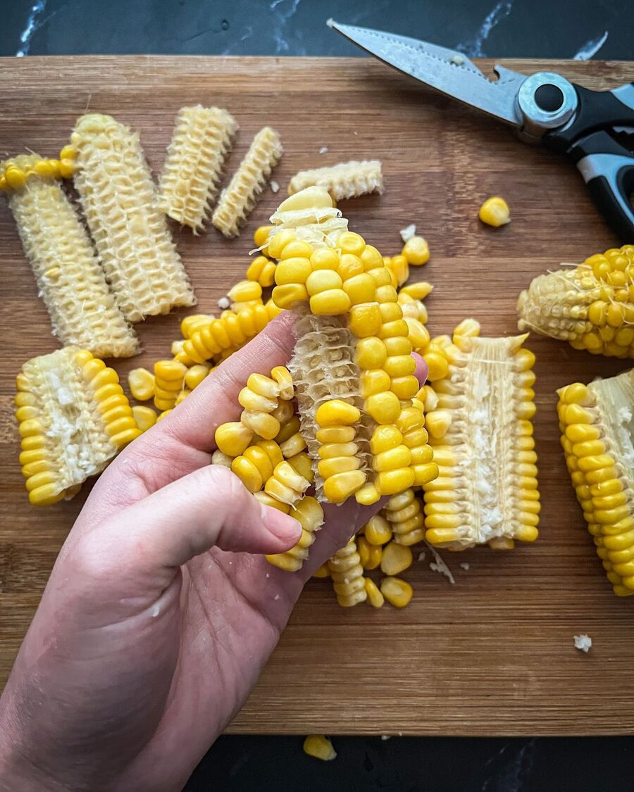Use your hand to remove the kernels from the cob. Take the corn kernels back to the steamer for about 5 minutes, or you can use a microwave to warm the corn kernels for about 1 minute.
