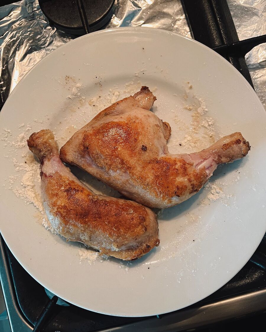 Remove the chicken from the pot.