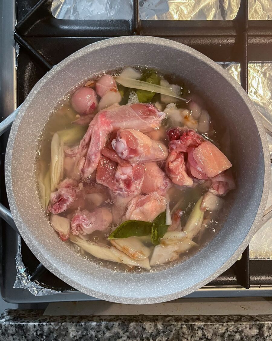 Add the chicken to the herbs and maintain the heat. Sprinkle in the salt and let the chicken slowly simmer, allowing the flavors to combine.