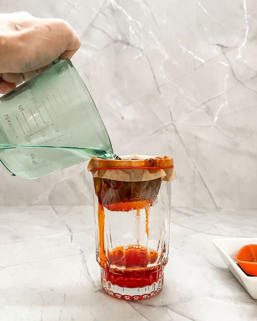 Use a tea filter to brew the tea by adding the Thai tea mix into the filter and pouring hot water over it. Let it steep for a few minutes. If you don’t have a tea bag filter, you can steep the tea in hot water for 3-5 minutes and then strain the tea through a fine mesh strainer.