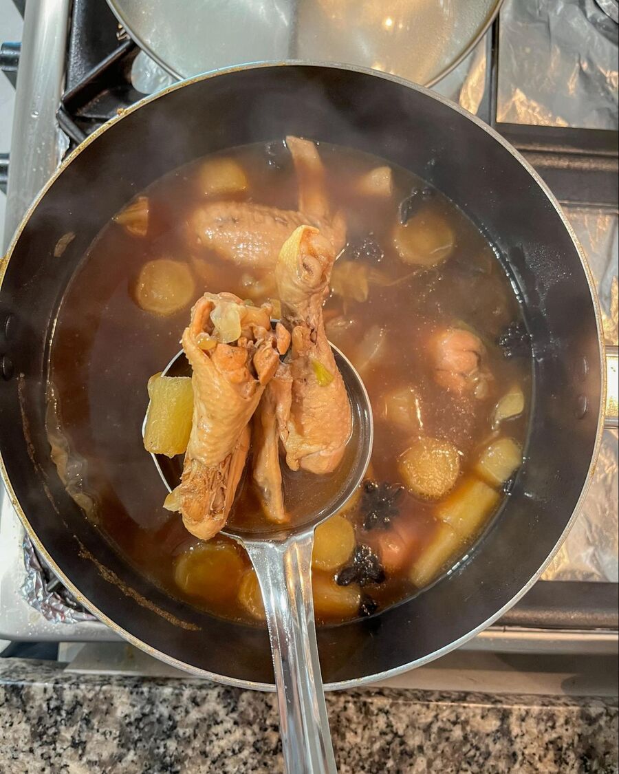 After 30 minutes, check your braised chicken. If it's ready, reduce the heat to low. Cover the pot and keep it hot until ready to use. 