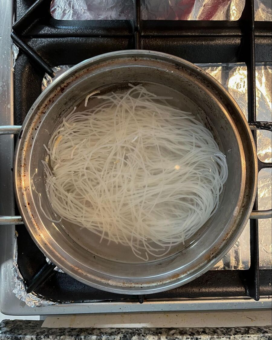 Bring a small pot of water to a boil to cook your noodles. Drop the noodles into the pot and follow the instructions from the package. If there are no instructions, simply drop the dry noodles and wait about 2-3 minutes until they are soft. Drain the water and transfer the noodles into a bowl. 