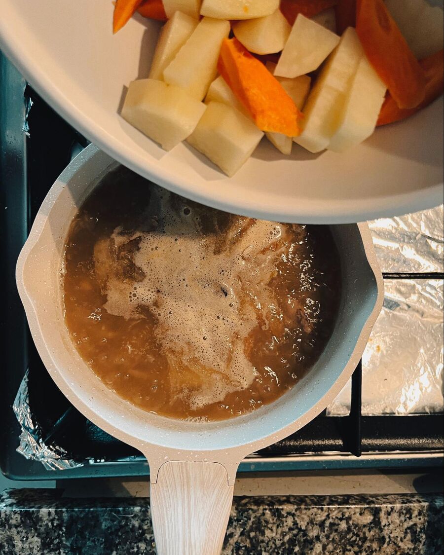 Add 3 cups of water and all of the chopped vegetables. Bring the mixture to a boil and let it simmer for about 25 minutes.