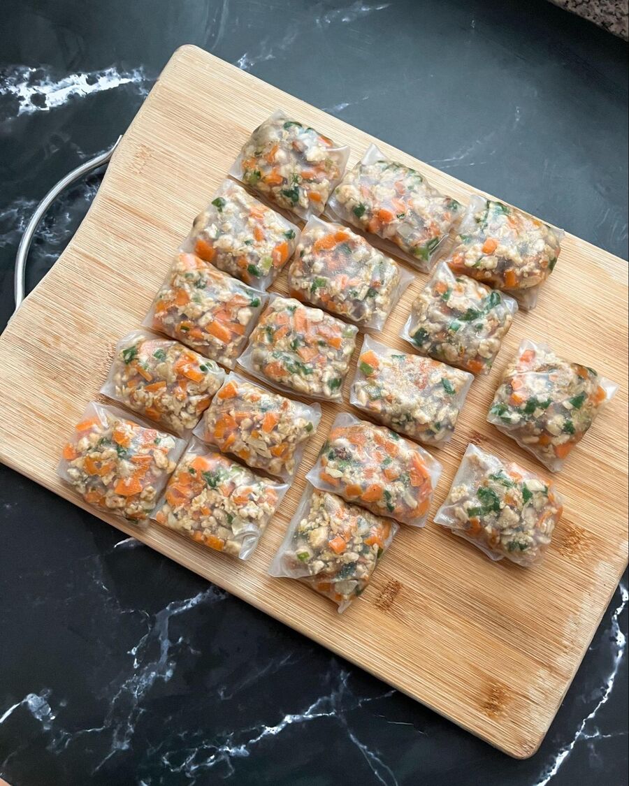 Then continue folding until all the dumplings are in the same square shape. Repeat this process until all the filling is used.