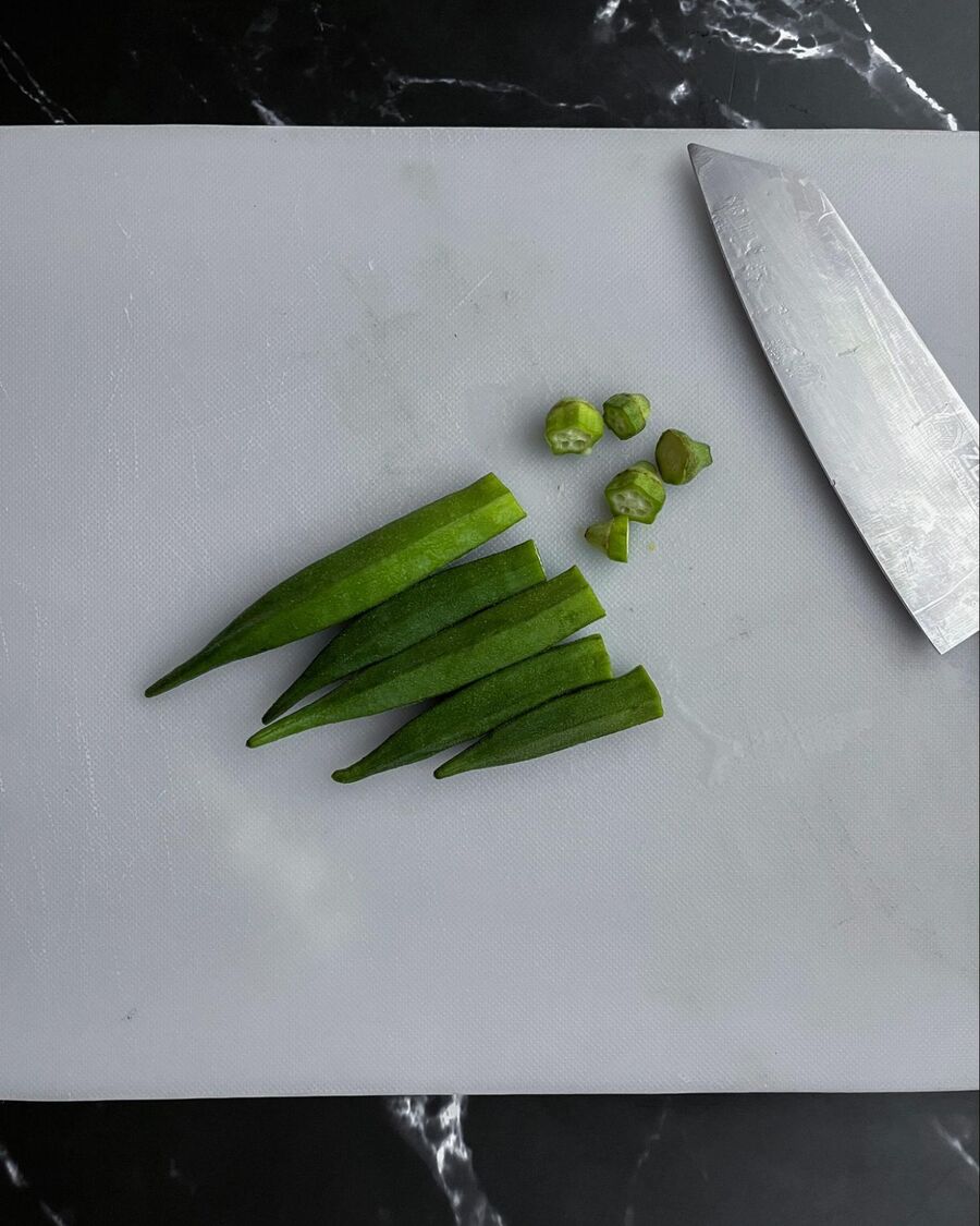 Rinse and pat the okra dry, then cut off the heads.