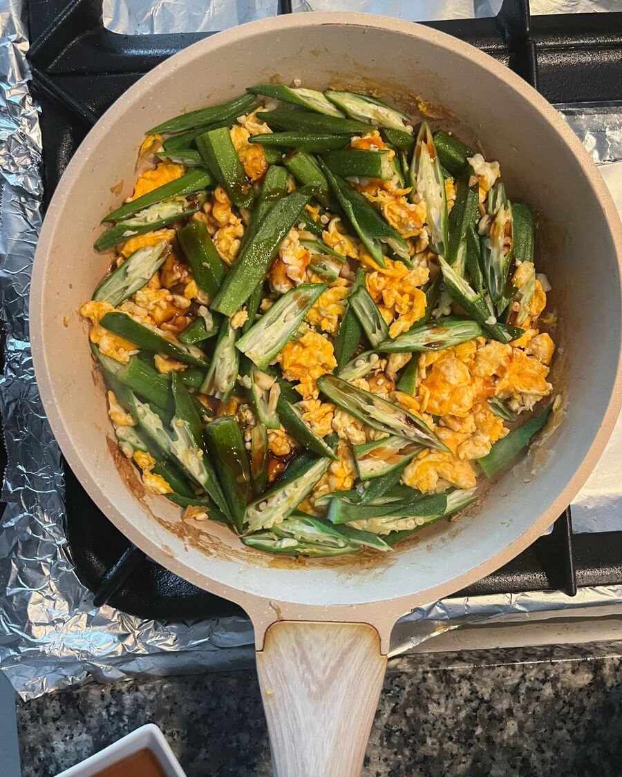 Add oyster sauce, soy sauce, sugar, and ground pepper. Stir to combine until the sauce coats the okra and eggs evenly.