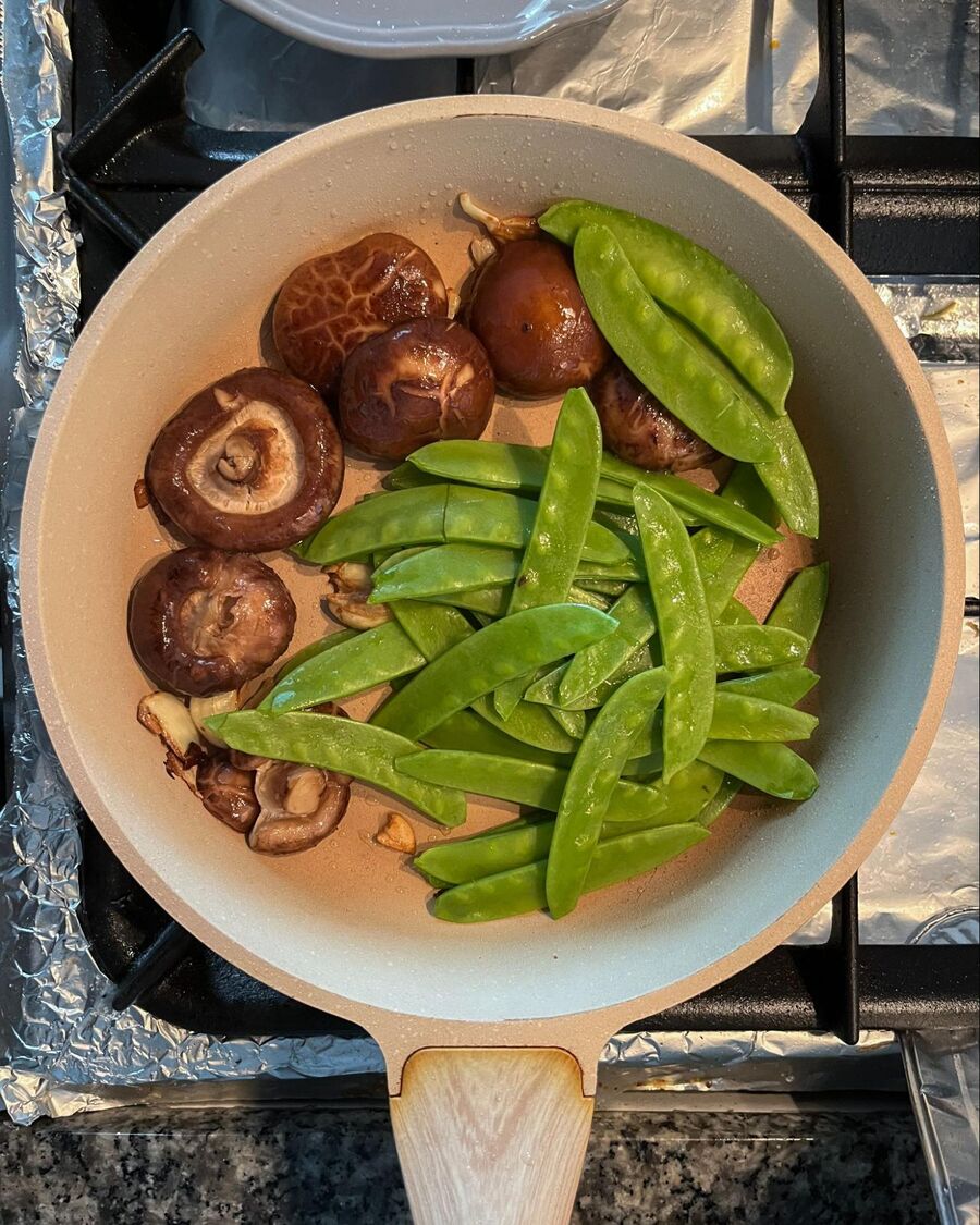 Add the snow peas and stir to combine them for about 30 seconds.