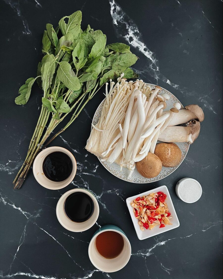 Start by gathering all the essential ingredients needed for the Thai Holy Basil Mushroom Stir-fry.