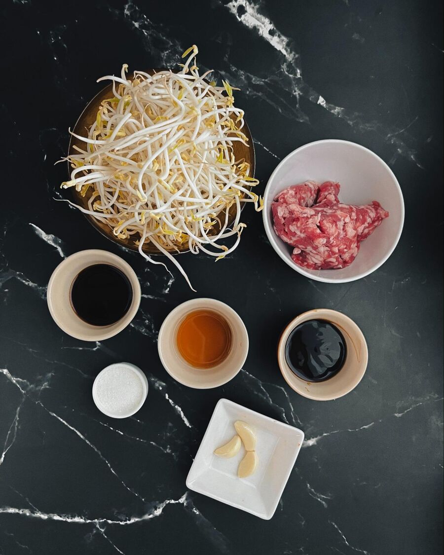 Start by gathering all the essential ingredients needed for the bean sprout stir-fry.