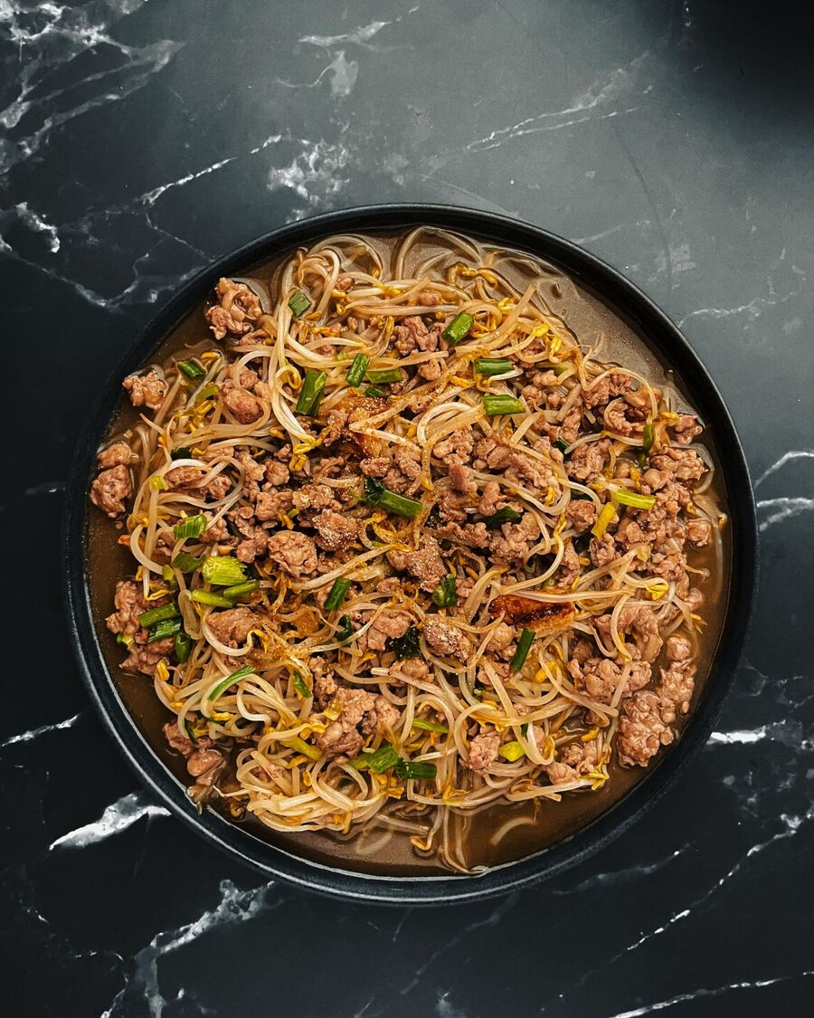 Sprinkle ground pepper over the bean sprout stir-fry. Serve with steamed rice and enjoy!