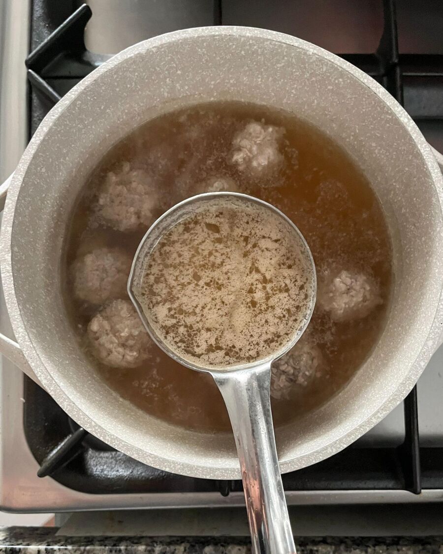 Once the soup starts to boil and bubbles appear, skim off any foam from the surface of the pot.