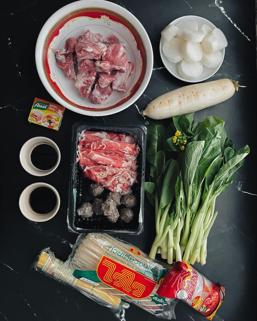 Start by gathering all the essential ingredients for the Thai clear noodle soup.