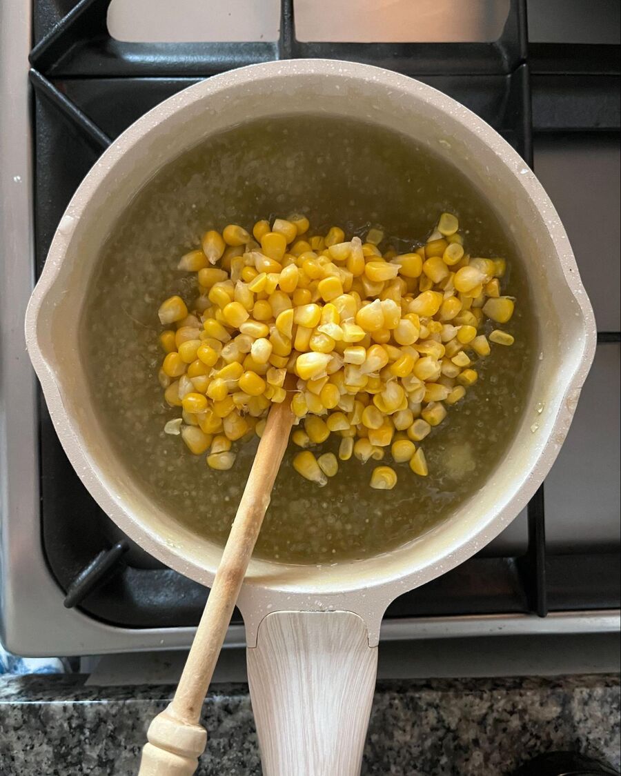 Add the corn kernels to the pot with the tapioca pearls and stir to combine. Let it sit at room temperature for about 20 minutes before serving.