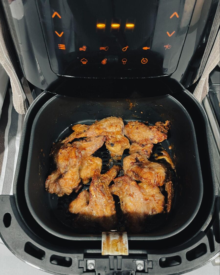 Check the chicken wings again. If they’re not quite ready, you can air fry them for an additional 2–3 minutes until the skin is golden brown and crispy.