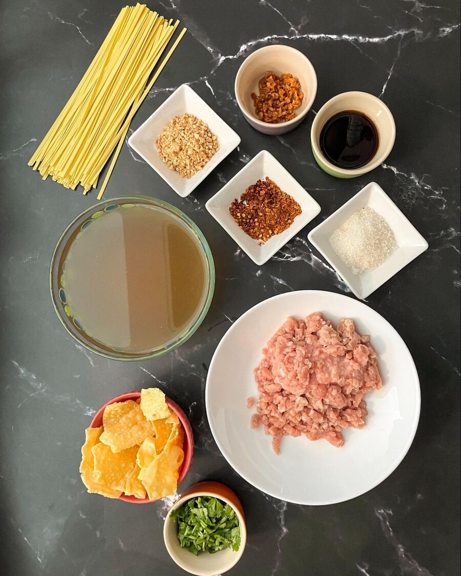 Start by gathering all the essential ingredients for your Tom Yum noodles.
