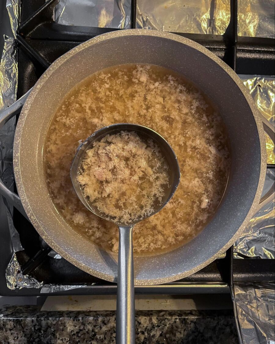 Continue boiling the pork until it’s fully cooked. Skim off any foam that rises to the surface to keep the broth clear.