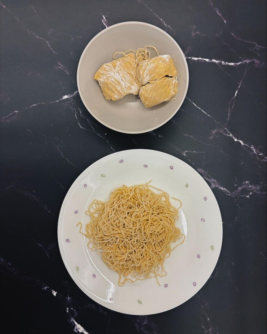 Gently separate the noodles to remove any excess flour before blanching. 