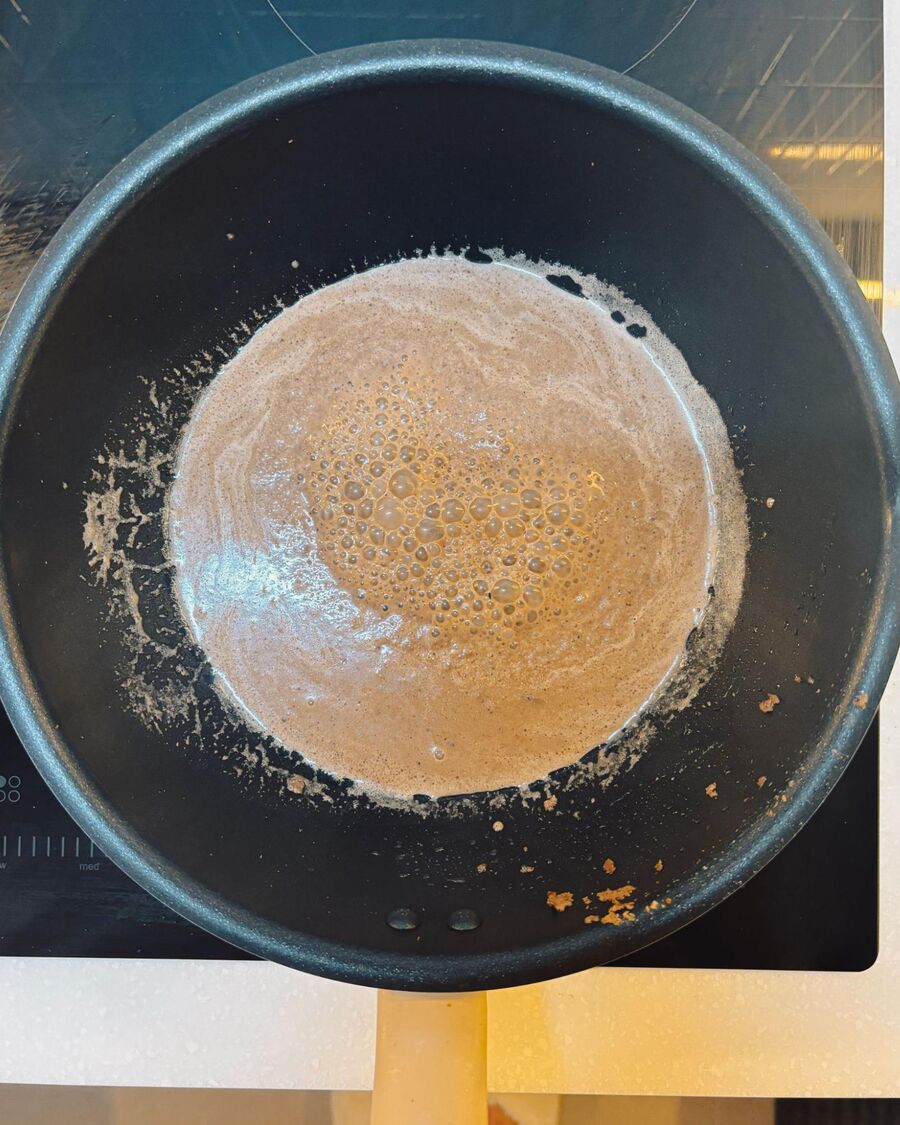 Add ½ cup of water and stir until the mixture begins to bubble.