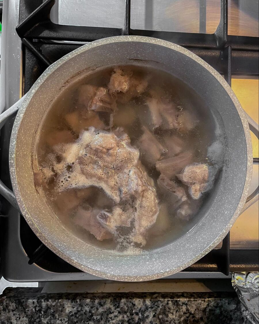 Boil the ribs for about 10 minutes until dark brown bubbles appear. Then remove the pot from the heat, discard the water, and refill with fresh water to boil.