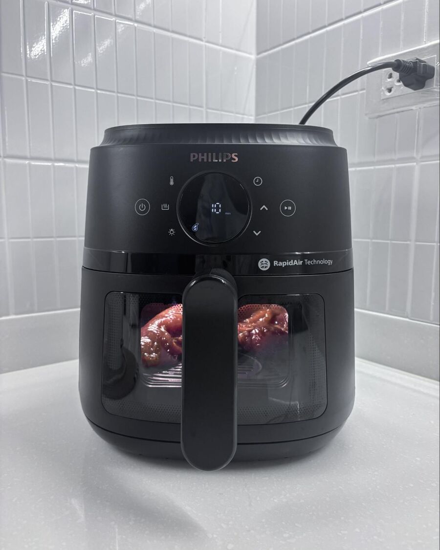 Once the pork is ready, preheat your air fryer to 180°C. Pop the marinated pork in and cook for about 10 minutes.